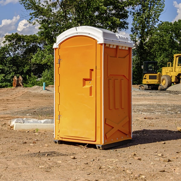 how often are the portable restrooms cleaned and serviced during a rental period in Coweta County